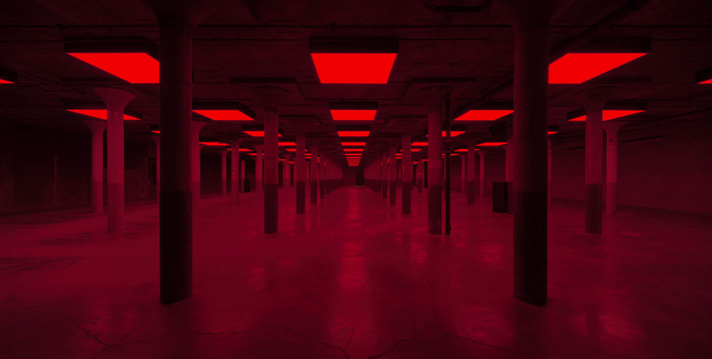 Bass at DIA Beacon, red-lit column installation